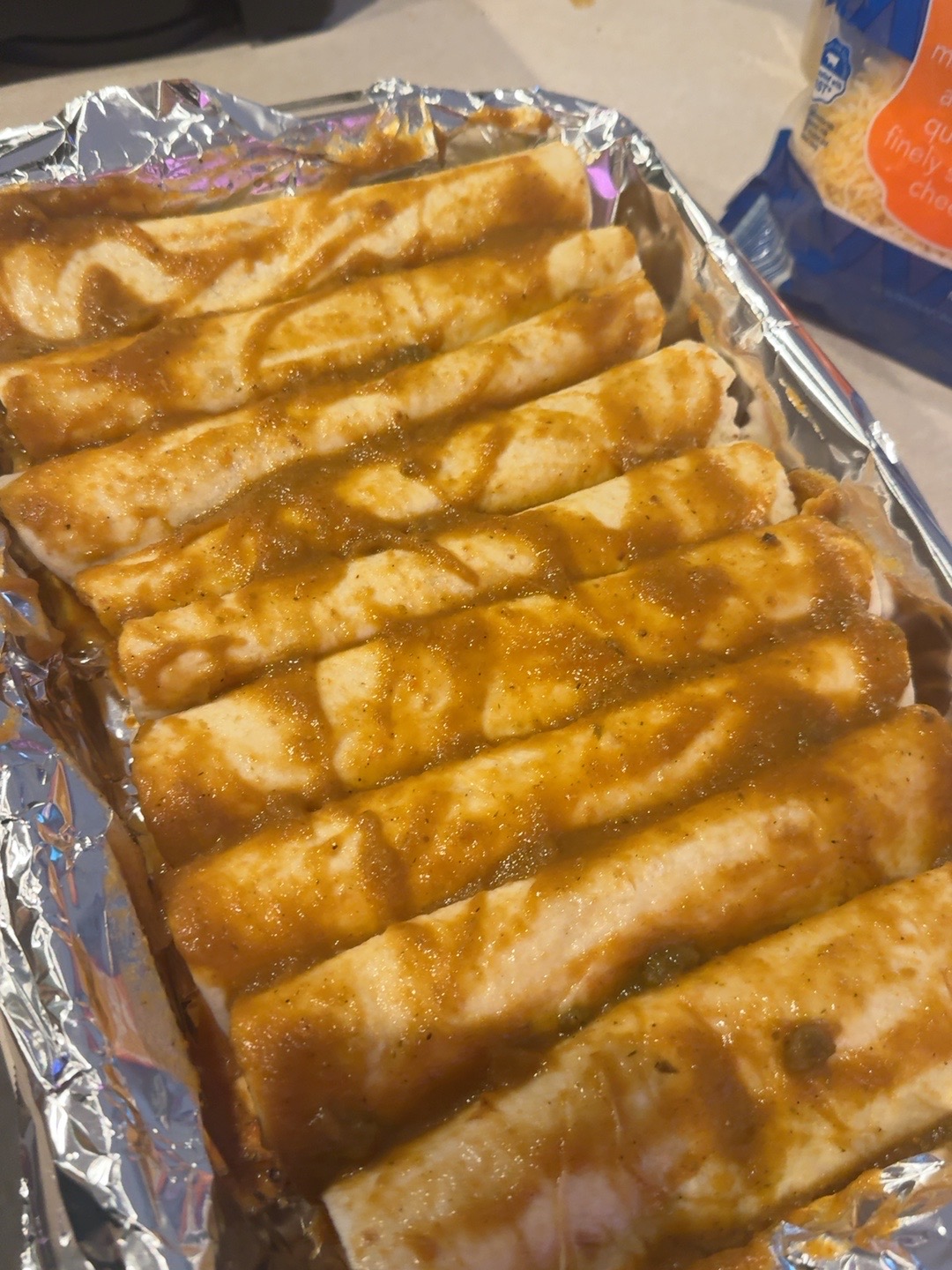 Rolled enchiladas covered with homemade smoky sauce