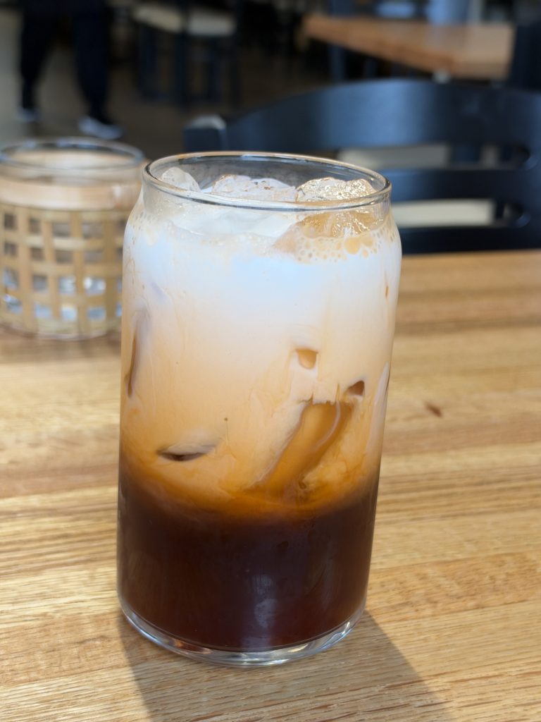 Thai iced tea served over ice at Hoang Khao