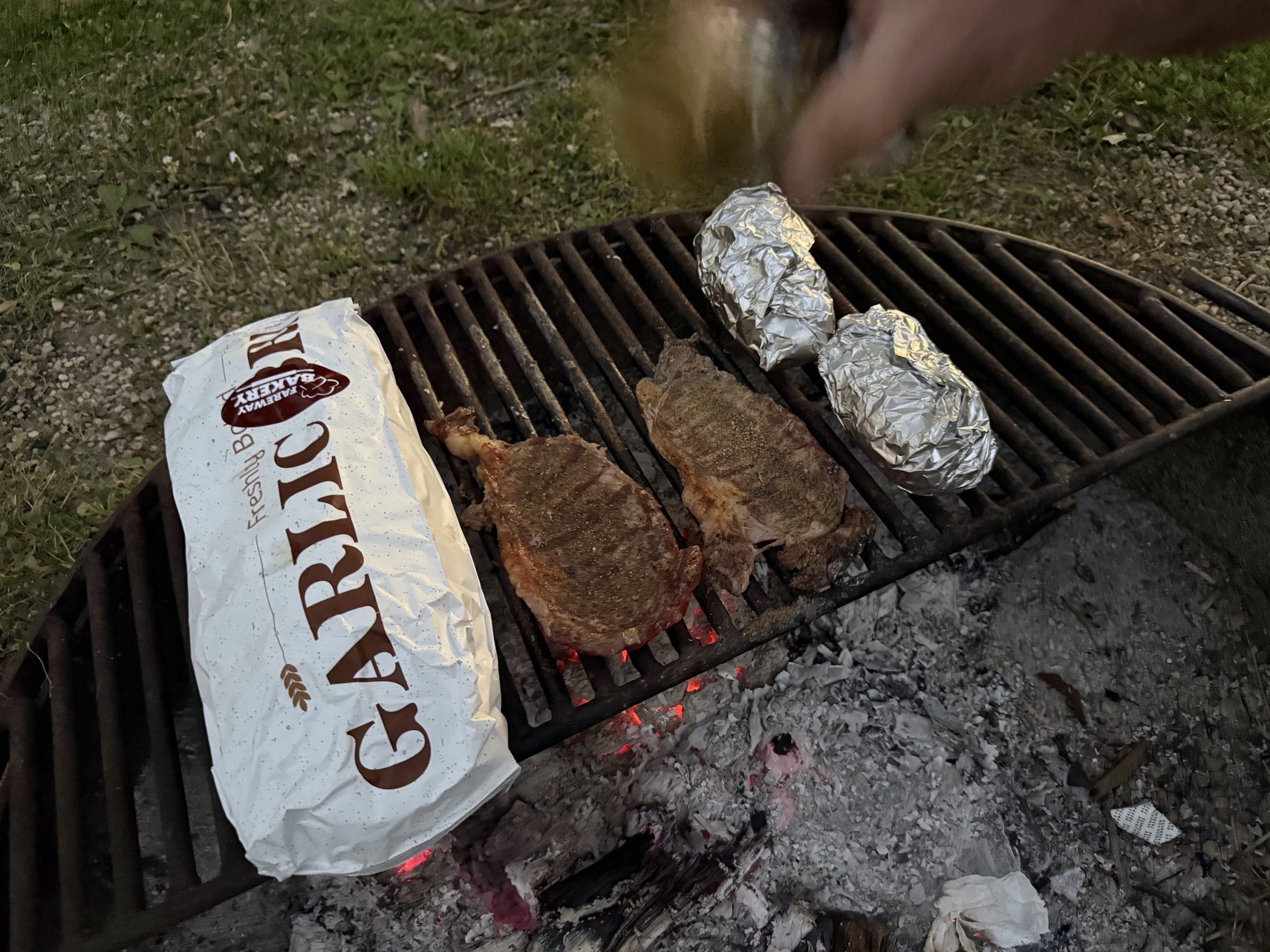 Steaks and sweet corn over the fire