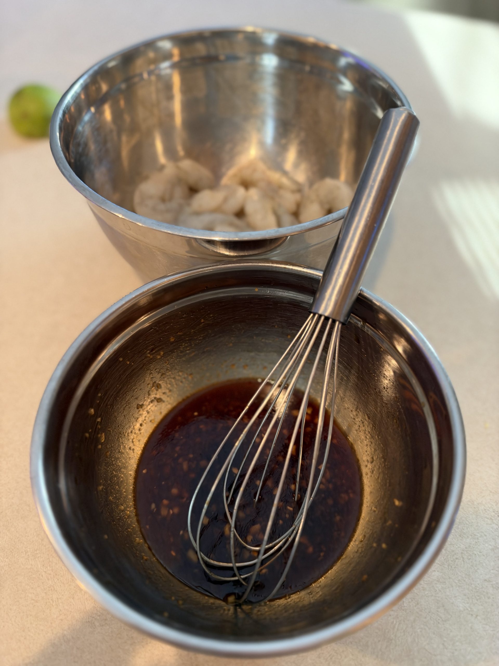 Honey Sriracha sauce being whisked